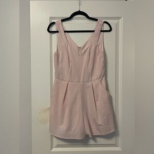 Francesca's Collections Light Pink Sleeveless Romper with pockets!